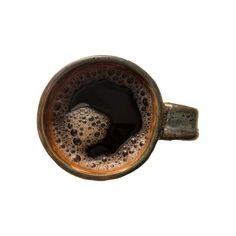 a close up of a coffee cup on a white background with water droplets in it