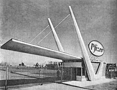 an old photo of a gas station in the 1950's