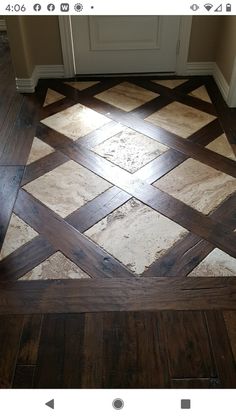 an image of a wooden floor with tile on it