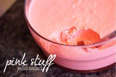 pink stuff in a glass bowl on a table