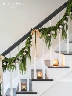 christmas decorations on the banisters and stairs