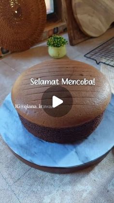 a chocolate cake sitting on top of a blue plate