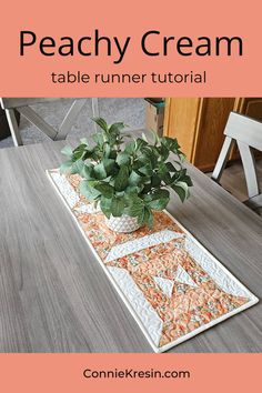 a table runner with a potted plant on it and text overlay that reads, peachy cream table runner