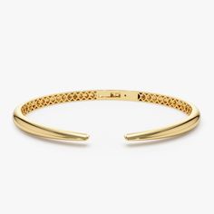 Elevate your wrist's style with our Solid Gold Spike Cuff, a statement piece that exudes elegance and edge. Crafted in 14K gold, this Open Cuff Bangle offers a sleek and versatile addition to your collection. Enhance your ensemble with this Plain Gold Bracelet Bangle, perfect for stacking or wearing alone, delivering a touch of timeless simplicity. Explore the allure of this Stackable Gold Bangle Bracelet, a chic and understated choice for your jewelry repertoire. ▶ Item Details * Handmade * Made to Order * Gold KT: 14K Solid Gold (also available in 18K) * Gold Color Options: Rose Gold, Yellow Gold, White Gold * Width: 1.50MM Graduates to 5.5MM * Height: 2.95 MM * Ready to Ship in 3-10 Business Days ▶ See more of our Gold Bracelets here - http://etsy.me/2l9VKBr ▶ See our storefront here - Plain Gold Bracelet, Gold Bracelet Bangle, Gold Armband, Bracelet Simple, Cuff Bangle Bracelet, Stacked Bangles, Ruby Jewelry, Gold Bangle Bracelet, Gold Bangle