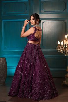 Festive Purple Hand Embellished Sets, Festive Hand Embellished Purple Sets, Festive Hand-embellished Purple Sets, Hand Embellished Purple Dress For Festive Season, Festive Hand-embellished Purple Dresses, Purple Sequin Dresses With Traditional Drape, Purple Bollywood Dress Hand Embellished, Traditional Hand Embellished Purple Dress, Purple Floor-length Evening Lehenga