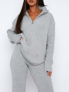 The GYPSY-Quarter Zip Top and Pants Set offers the perfect blend of comfort and style. With its soft and cozy fabric, you'll feel relaxed and stylish at the same time. This set is perfect for lounging or running errands. (Slay in style and comfort with this set!) PRODUCT MEASUREMENTS (INCH) 🅾️ Size Top Length Bust Sleeve Length Hip Waist Waist Stretch Amount Bottom Length One Size 24.4 42.5 30.3 0 19.7 42.5 37 OUR SIZE CHART HACK! WE USE THESE ICONS AS A GUDIE TO INFORM OUR CUSTOMERS HOW THE MEASURMENTS COMPARE TO A STANDARD U.S. SIZE CHART SO YOU CAN MAKE THE BEST DECSION WHEN ORDERING. 🔷Runs True ⏹️Runs Small 🌗In between 🟡Runs Large 🌀Junior Size 🅾️One Size Stretch: Moderate stretch Material composition: 95% polyester, 5% spandex Care instructions: Machine wash cold. Tumble dry low Top And Pants Set, Grey Knit Sweater, Top Pants Set, Knit Pants, Everyday Wardrobe, Cardigan Jacket, Grey Sweater, Long Sleeve Top, Quarter Zip