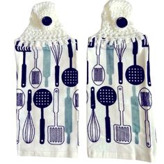 two oven mitts with cooking utensils on them, one is white and the other is blue