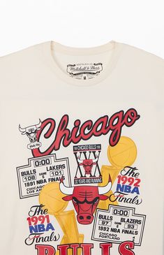 Treat yourself to a fresh pick from Mitchell & Ness with the new  Chicago Bulls Champions T-Shirt. This retro tee has a bold vibe with printed graphics on the front, a comfortable crew neckline, short sleeves, regular fit, and woven Hardwood Classics tag at the left hem.


	Crew neckline
	Short sleeves
	Standard fit
	Front graphic
	100% Cotton
	Machine washable Sports Merch, Basketball Tshirt Designs, Vintage Tshirt Design, Branding Content, Nba T Shirts, Chicago Shopping, Graphic Tshirt Design, Vintage Jerseys, Retro Tee