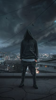 a man standing on top of a roof in front of a cityscape at night