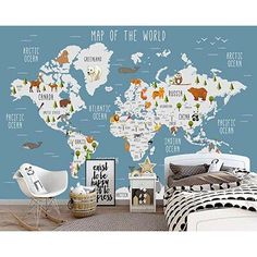 a map of the world with animals and trees on it's wall in a child's bedroom