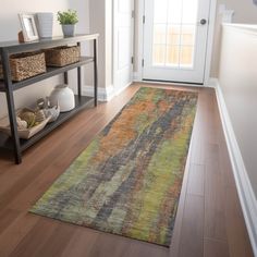 a rug on the floor in front of a door