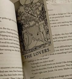 an open book with the title of the lover's written in black and white