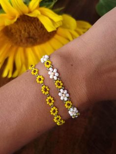 Get 20% off when buying 3 gold filled/plated products with the code 3BUNDLE 🌻 Sunflower beaded with 2mm glass beads. Choose between a Brass or aGold filled clasp.  This fine jewellery is beautiful on its own or stacked together with other braclets and can be worn both as a daily pice or for special occasions. It's a eye-catcher without screaming out loud it's existence. The standard length is 16.5 cm from clasp to ring and comes with extra adjustable closing rings of 2 cm. But please let me know if you would like it in a specific size, they can both be made bigger or smaller. Jewellery care  - Be mindful where you put on your perfume when wearing the bracelet and avoid putting it near your bracelet. The chemicals in the parfume may react with the plating and cause it to tarnish. Strong bo Sunflower Bracelet, Strong Body, Chain Link Bracelet, Star Fashion, Jewelry Care, Link Bracelets, Chain Link, Favorite Jewelry, Sweden