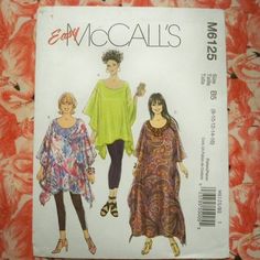 two women's tops and one woman's dress sewing pattern