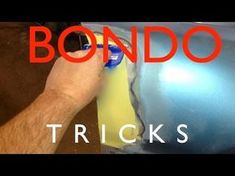 a man holding onto a blue ball with the words bondo tricks written on it