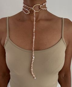 ** Pearl Necklace loops through Ring and can be wrapped once or multiple times. PEARLS are symbolic of wisdom gained through experience. The gems are believed to offer protection, as well as attract good luck and wealth. They are well-known for their calming effects. Pearls have a way of bringing balance to your karma, bring illumination, enlightenment, and insights on a mental level. Pearls symbolize purity and is known as a “stone of sincerity”. It brings truth to situations and loyalty to a “ Spiritual Pearl Jewelry With Gemstone, Long Pearl Chain Necklace As Gift, Long Pearl Chain Necklace For Gift, Adjustable Lariat Jewelry With Natural Stones, Pearl Chain Lariat Jewelry As Gift, Pearl Chain Lariat Jewelry For Gift, Elegant Wire Wrapped Necklaces, Elegant Wire Wrapped Jewelry For Meditation, Bohemian Long Pearl Chain Necklace