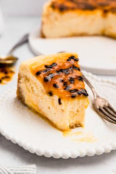 a piece of cheesecake on a plate with a fork