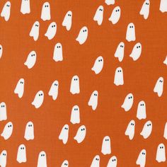 an orange background with white ghost silhouettes