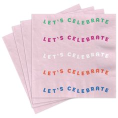 four pink napkins with different colored lettering on them