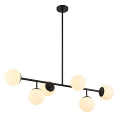 a black chandelier with five lights hanging from it's center and four balls on the bottom