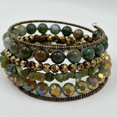 This Coil Wrap Bracelet Is Made With 6 Rows Of Gorgeous Gemstones Including Green Jasper And Serpentine, Faceted Glass Beads, And Large Sparkling Crystals On Silver Memory Wire Wire Beaded Bracelets, Memory Wire Jewelry, Memory Wire Wrap Bracelets, Beaded Memory Wire Bracelets, Beaded Memory Wire, Wire Bracelets, Memory Wire Bracelet, Green Jasper, Wire Wrapped Bracelet