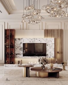 an elegant living room with marble walls and chandeliers hanging from the ceiling above