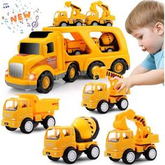 a young boy playing with construction vehicles