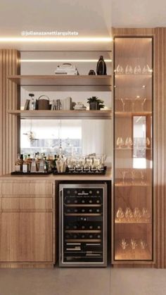 an appliance with wine glasses and bottles on the shelves in front of it