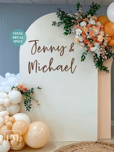 there is a sign that says jenny and michael on it with balloons in the background