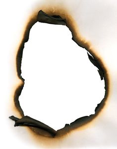 a piece of burnt paper that has been torn in half