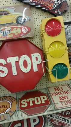 stop signs and stickers are on display in a store