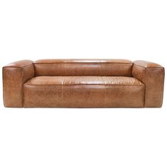 a brown leather couch sitting on top of a white floor