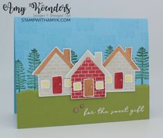 a handmade card with some houses on it