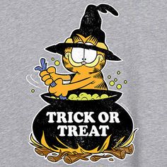 Featuring Garfield dressed as a witch stirring a cauldron and "Trick or Treat" in bold lettering, this women's and junior's graphic t-shirt is a must-have addition to your spooky wardrobe. It's made from a heather grey-colored knit cotton-blend and has a regular-fit, a crew neck, and short rolled sleeves. Character: GarfieldClosure Type: Pullover HeadFit: Regular FitNeckline: Crew NeckSleeve Length: Short SleeveFiber Content: 90% Cotton, 10% PolyesterFabric Description: KnitCare: Machine Wash, T Garfield And Odie, Bold Lettering, Rolled Sleeves, Top Graphic Tees, Toddler Boy Outfits, Disney Toys, Kids Outfits Girls, Fleece Sweatshirt, Memorable Moments