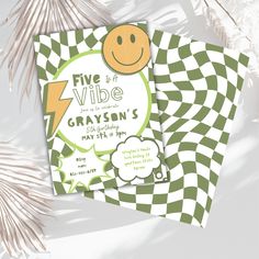 a green and white checkered design with a smiley face on it's card