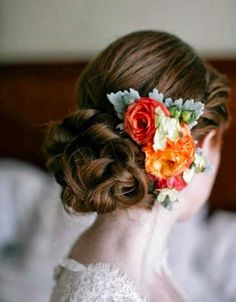 a woman with flowers in her hair