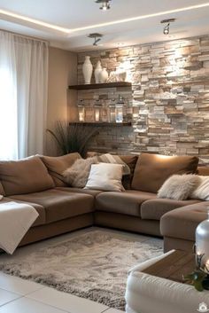 a living room filled with lots of furniture next to a wall covered in stone tiles