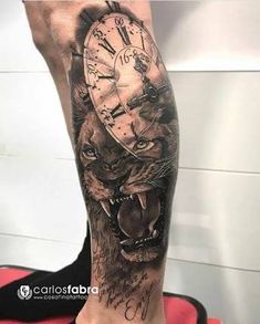 a man's arm with a clock on it and a tiger head in the middle