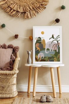 an animal print is displayed on a table next to a wicker chair and basket