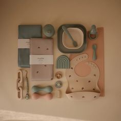 various items are arranged on the wall to make a playroom for babies and toddlers