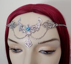 "This is a new handmade headpiece. It is made with light weight silver tone filigree centerpieces, accented with a high quality AQUA glass rhinestone that sparkles like crystal. Decorated portion measures 5 1/4\" wide and 1 3/4\" tall in the middle, and is worn with silver plated cable chain. Over all length is adjustable 21-24\" with a lobster clasp and chain extender in the back. If you would like a different length, please send us a message." Circlet Crown, Handmade Headpiece, Tiara Headband, Celtic Goddess, Goth Fairy, Gothic Fairy, Headpiece Jewelry, Crown Tiara, Fairy Queen