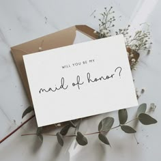 a card with the words will you be my maid of honor? written on it