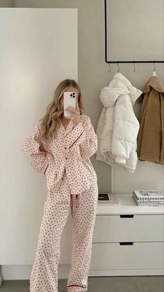 a woman taking a selfie in her pajamas