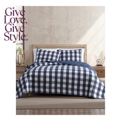 a black and white checkered comforter set on a bed with the words give love, give style