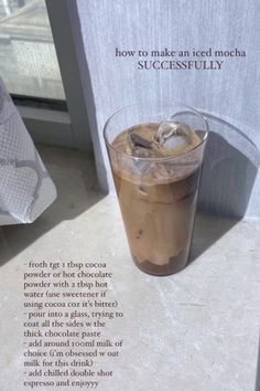 an iced drink with ice sits next to a sign that says how to make an iced mocha successfully