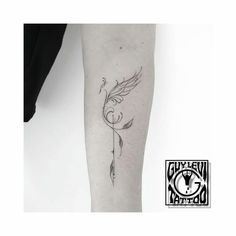 a woman's leg with a bird tattoo on the left side of her arm