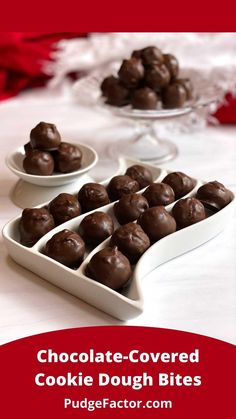 chocolate covered cookie dough bites in white dishes on a table with red and white cloth