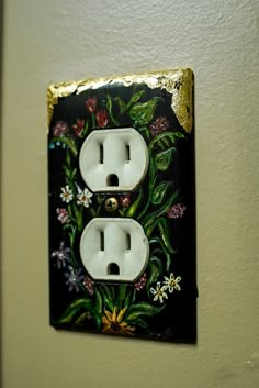 Hand painted light switch and outlet covers. Can be made custom. Email details to discuss custom orders  Magnoliagreenhouseevents@gmail.com Painting On Light Switch Covers, Painted Wall Outlets, Electrical Box Painting, Custom Light Switch Covers, Painting Light Switch Covers, Cool Light Switch Covers, Light Switch Art Paint, Painting Light Switches, Outlet Painting Ideas Easy