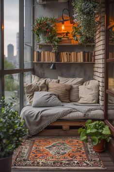 a couch sitting on top of a window sill next to a potted plant