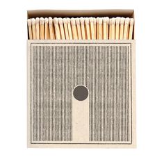 matches in a cardboard box on a white background